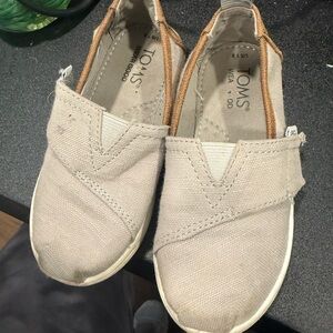 TOMS Light Tan Canvas Slip-Ons